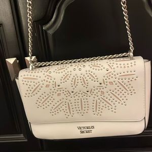 Victoria’s Secret white handbag with silver chain can be a long chain or doubled